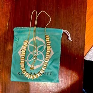 Kendra Scott adjustable gold-tone necklace with crystals.